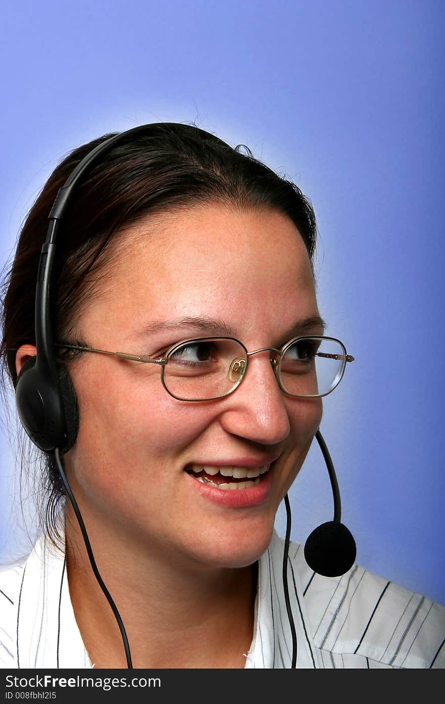 Digital photo of a young woman with a headset. Digital photo of a young woman with a headset.