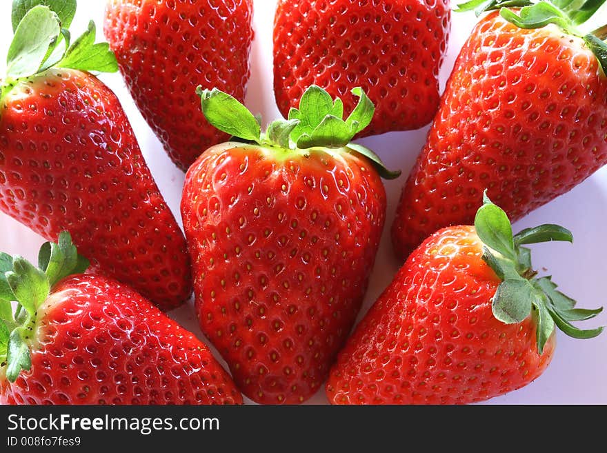 Strawberries compostion, few fruits on whire background. Strawberries compostion, few fruits on whire background