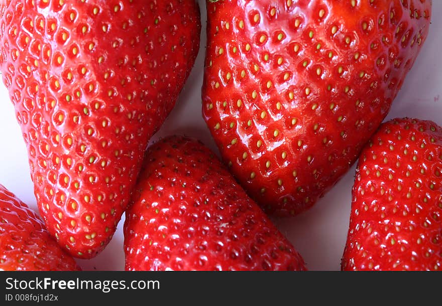 Strawberries compostion, few fruits on whire background. Strawberries compostion, few fruits on whire background