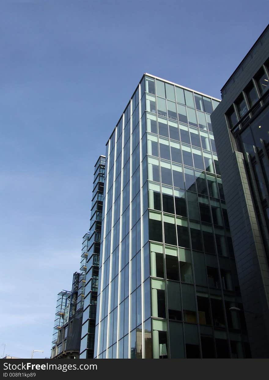 A modern glass building in central London. A modern glass building in central London.