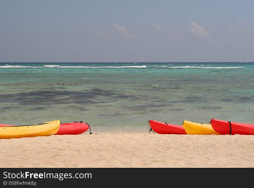 Beach, Ocean, Red and Yellow Kayaks