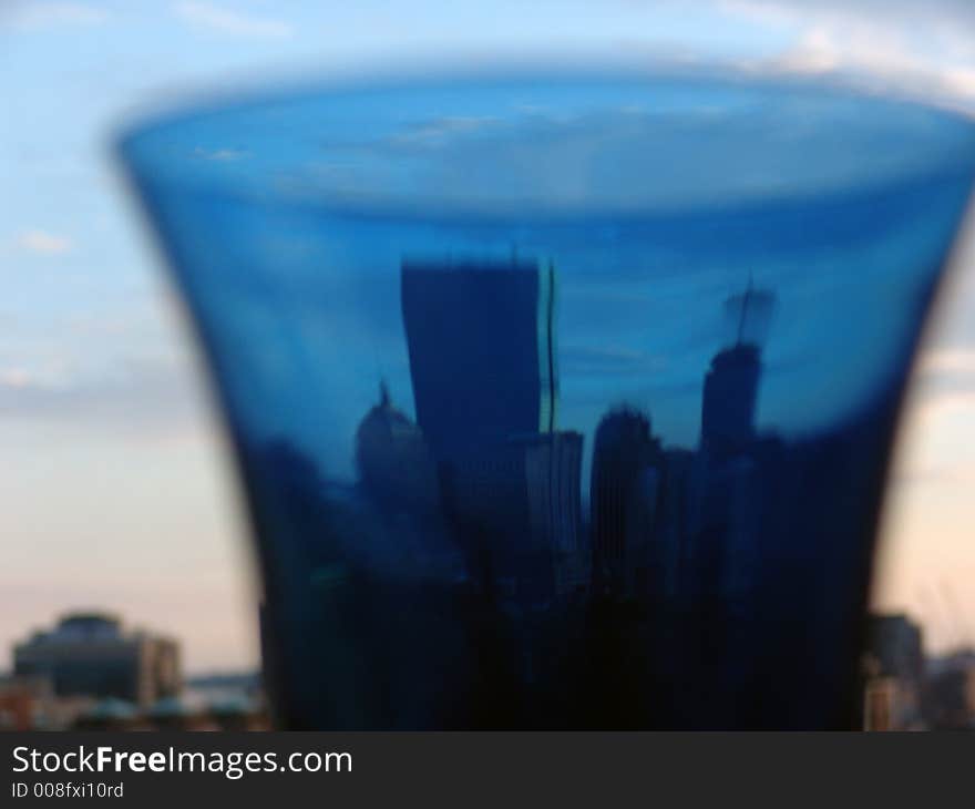 A distorted image of the boston skyline as seen through a blue glass. A distorted image of the boston skyline as seen through a blue glass