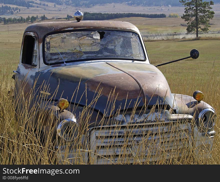 This image of the old rusted out truck abandoned in the field was taken in NW Montana. This image of the old rusted out truck abandoned in the field was taken in NW Montana.