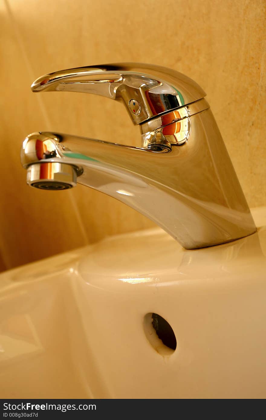 A silver steel tap in bathroom