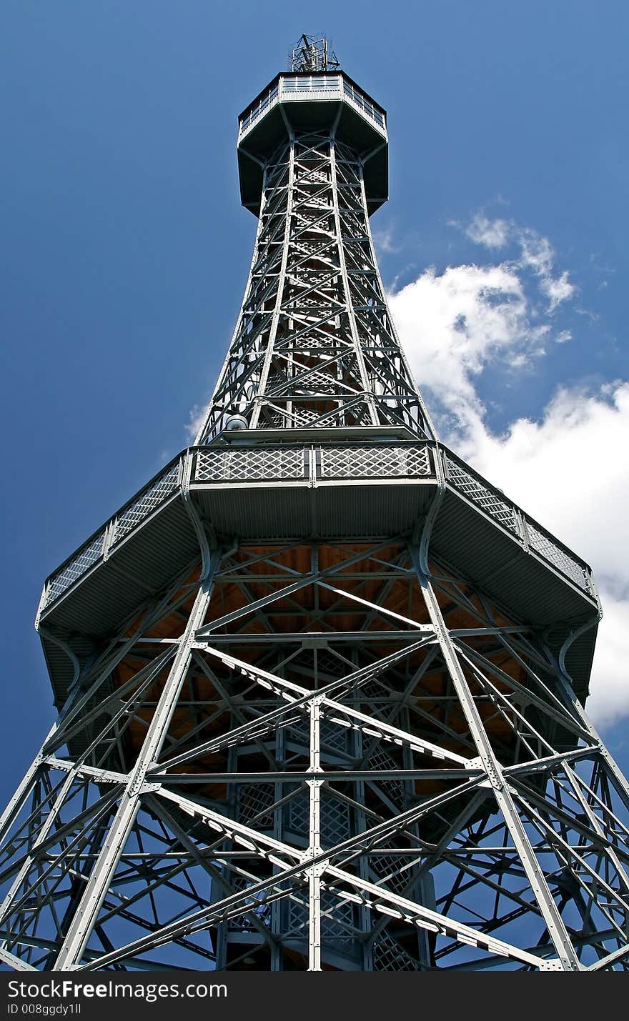 A steel tower with sky as background