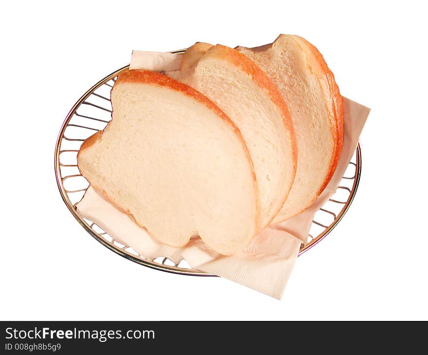 Fresh bread in a wire bowl. Fresh bread in a wire bowl