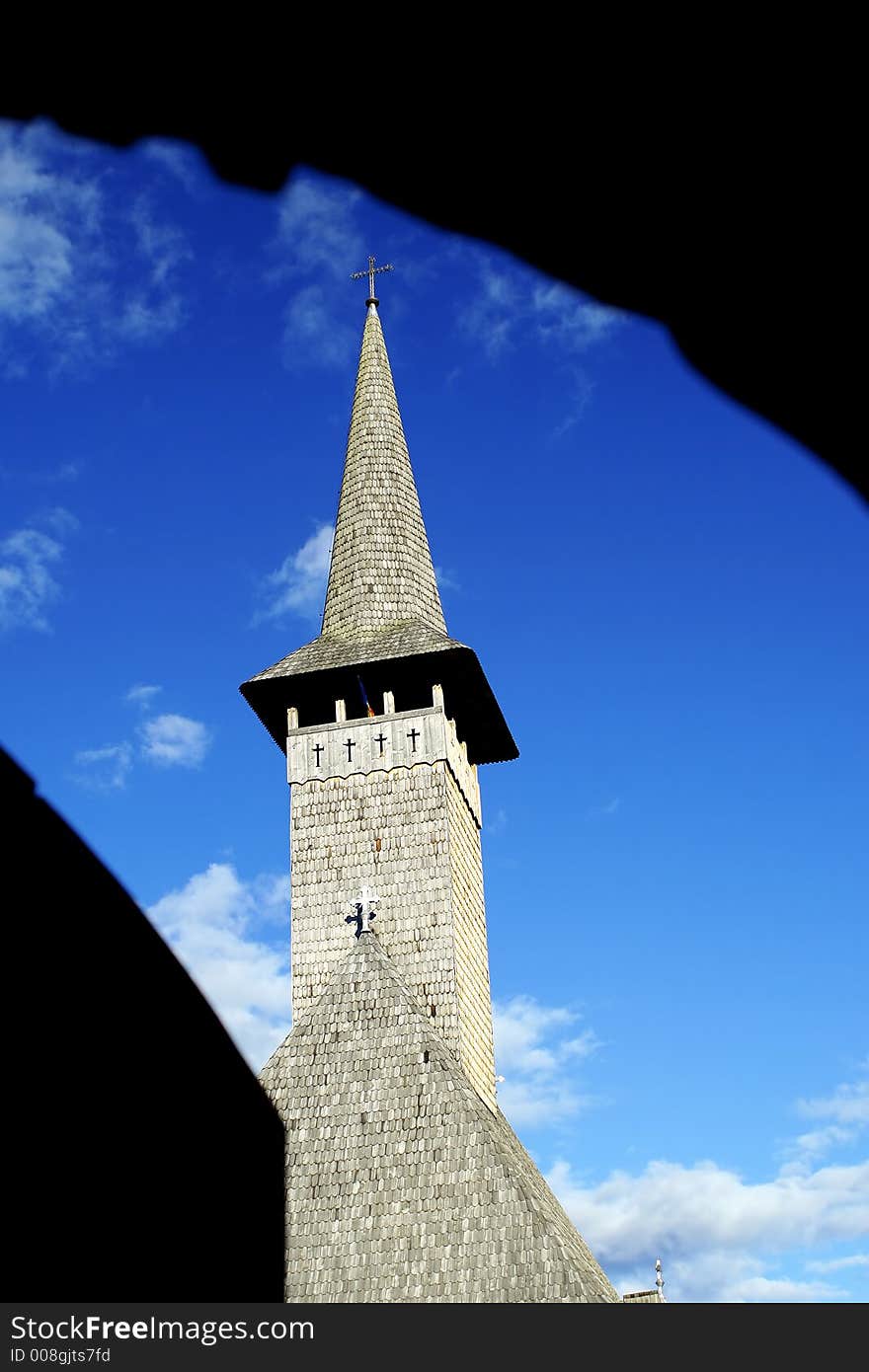 Silhouette of a church tower on the blue sky. Silhouette of a church tower on the blue sky