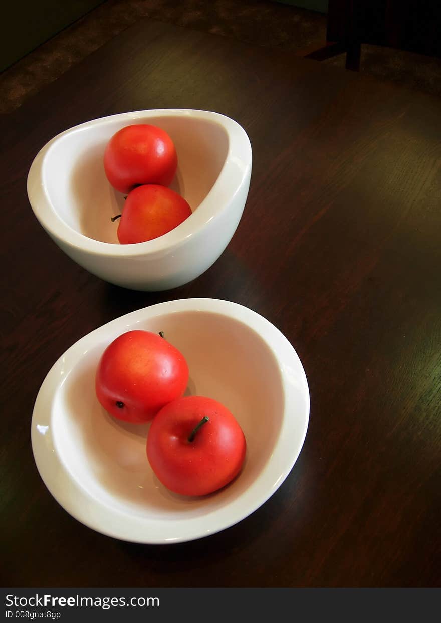 Still life with vases of red apples