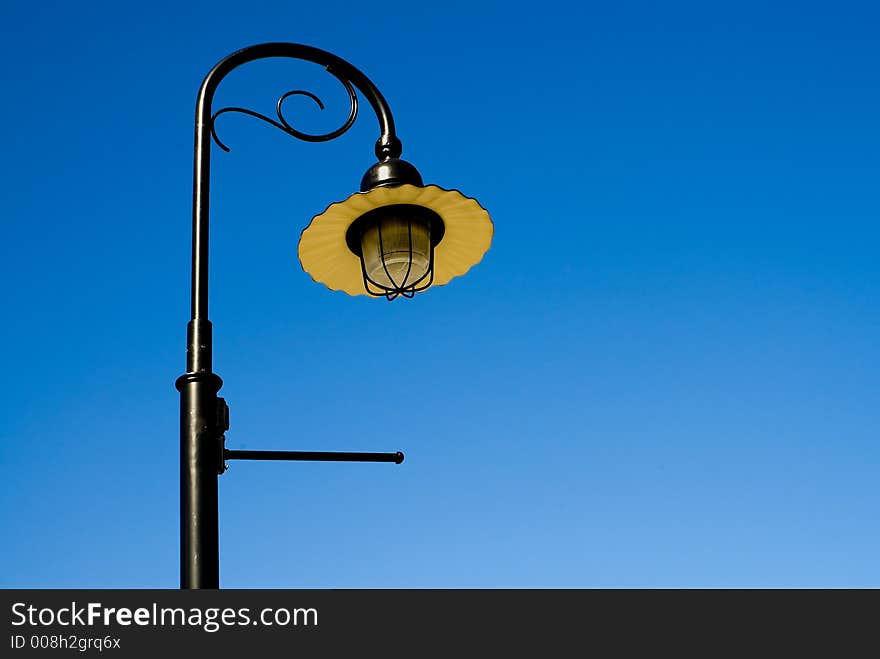 Graceful Streetlight and Blue Sky