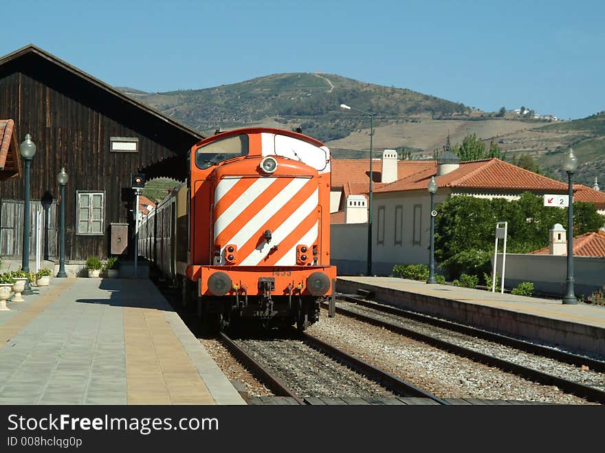 Railway station with train in country