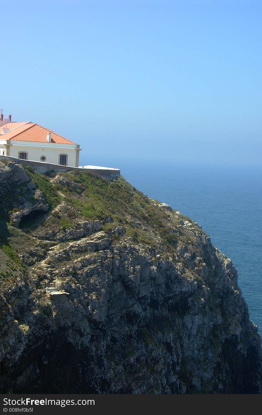 White house on coast of Atlantic ocean in Portugal. White house on coast of Atlantic ocean in Portugal