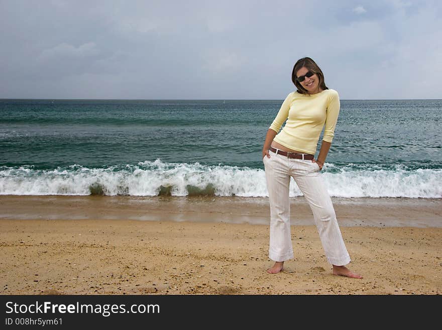 Beautiful woman posing in the beach. Beautiful woman posing in the beach