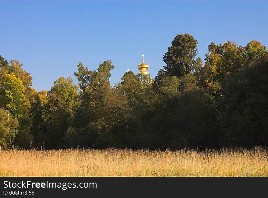 Field near christian church in New Jerusalem near Istra, Moscow region, Russia