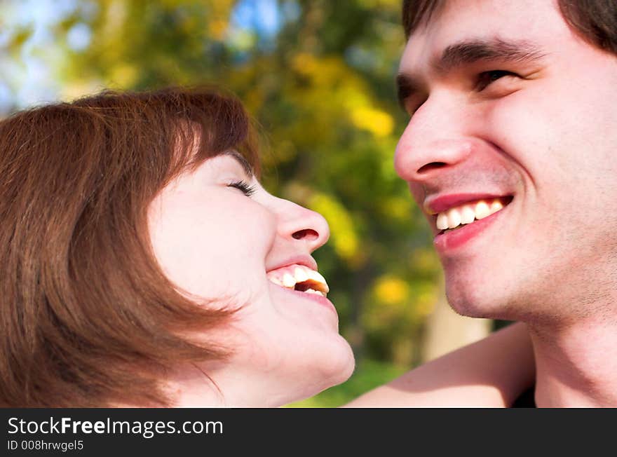 Laughing couple in the forest