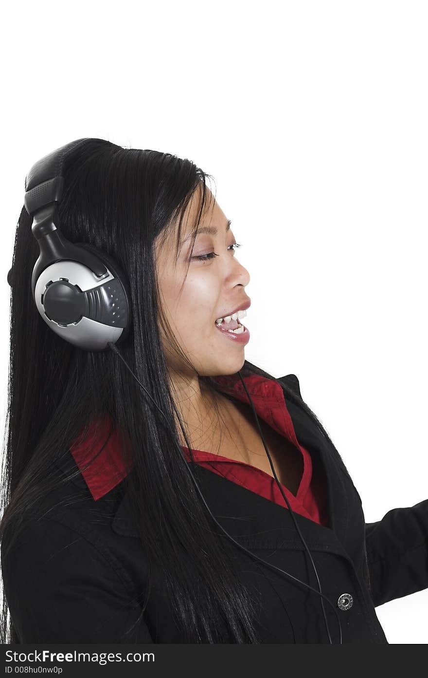 Woman listening to music over white background