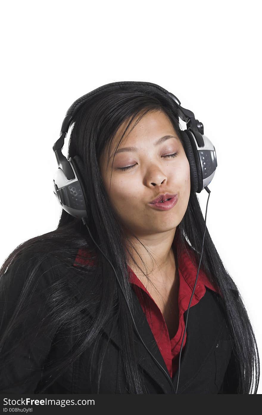 Woman listening to music over white background