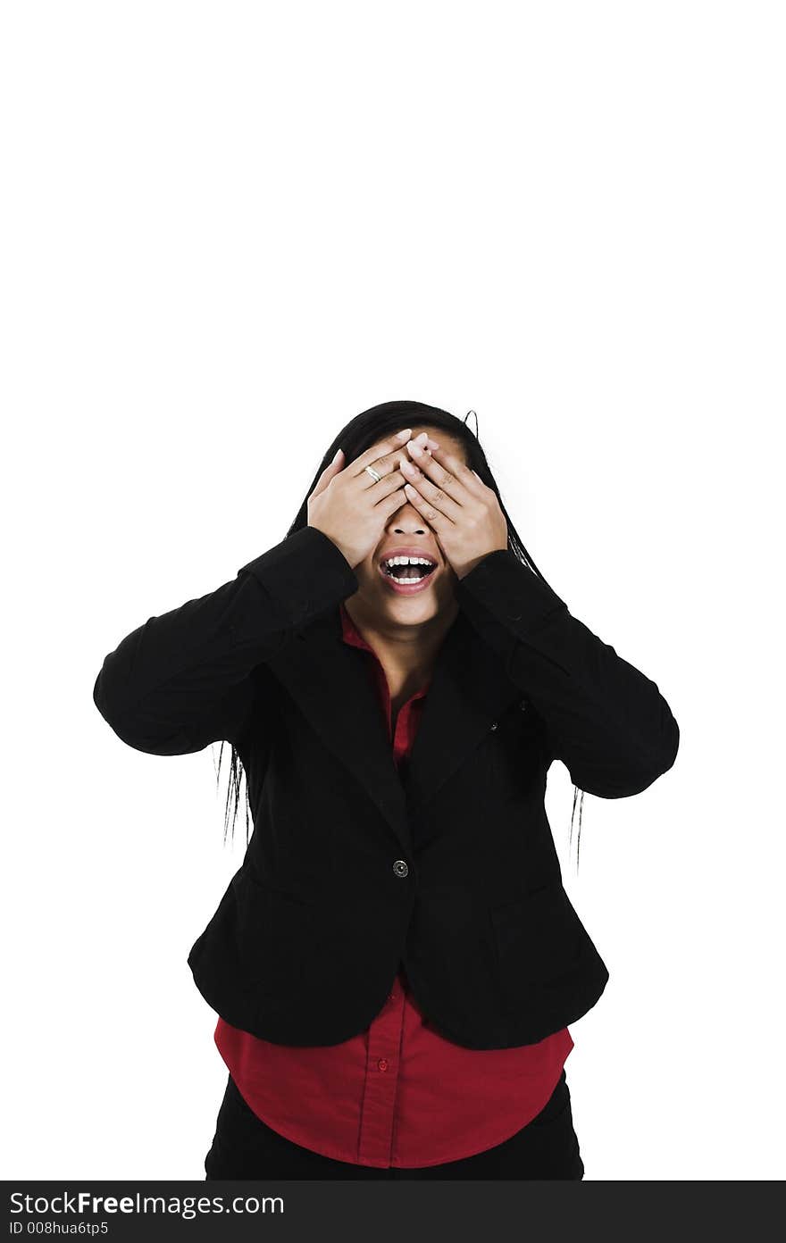 Woman covering her eyes over white background