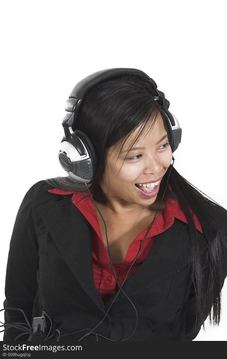 Woman listening to music over white background