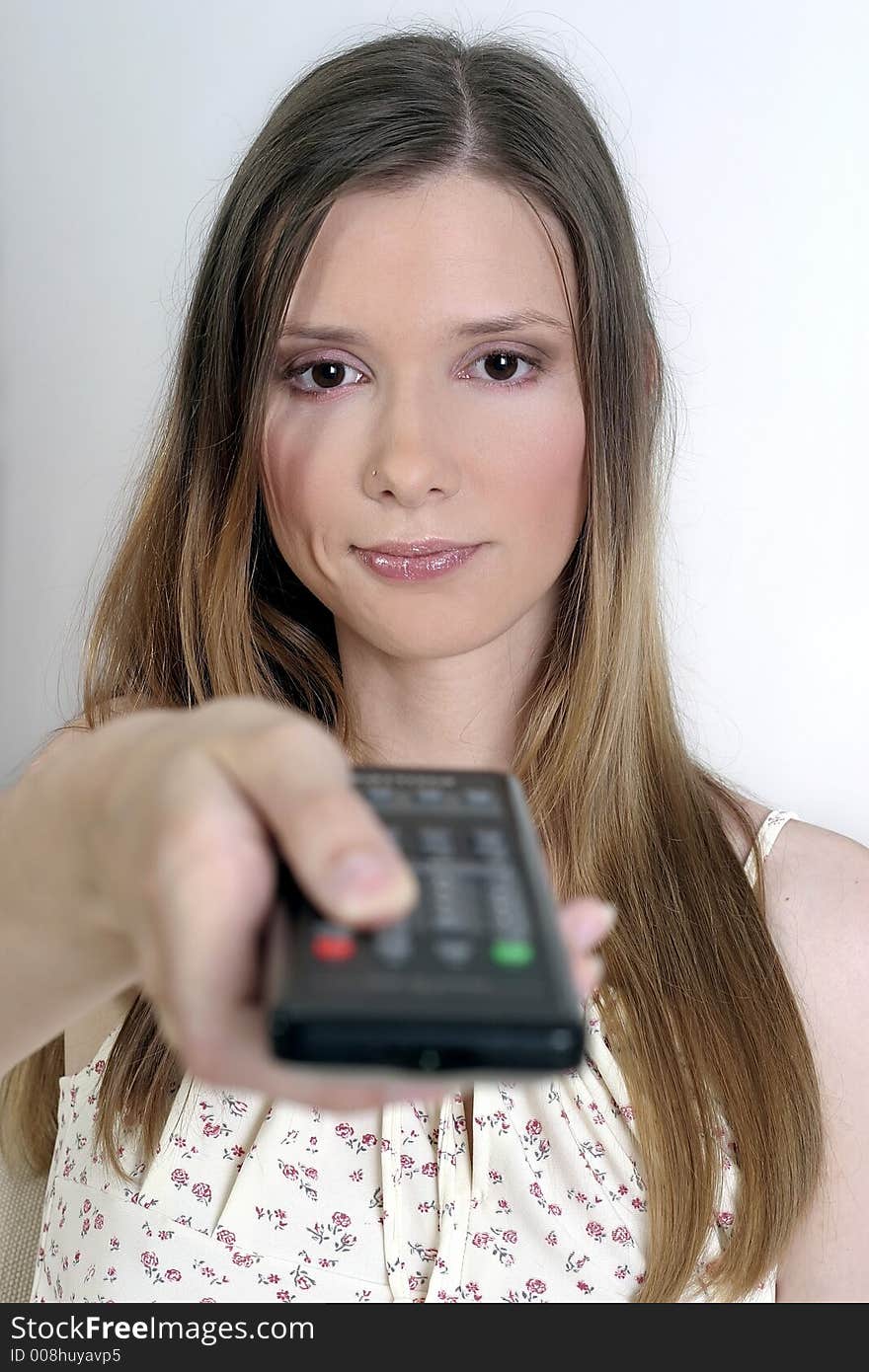 Disgusted woman with a remote control