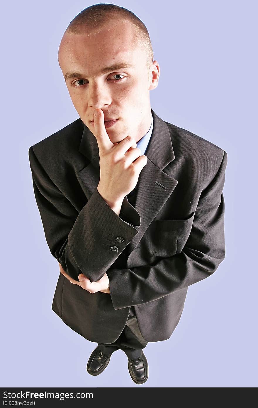 Elegant man, businesman in  a suit thinking