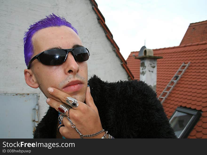 Pensive punk with purple hair