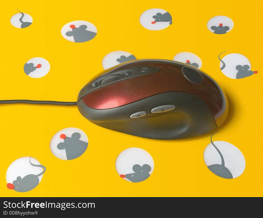 Mouse on cheese mousepad with holes