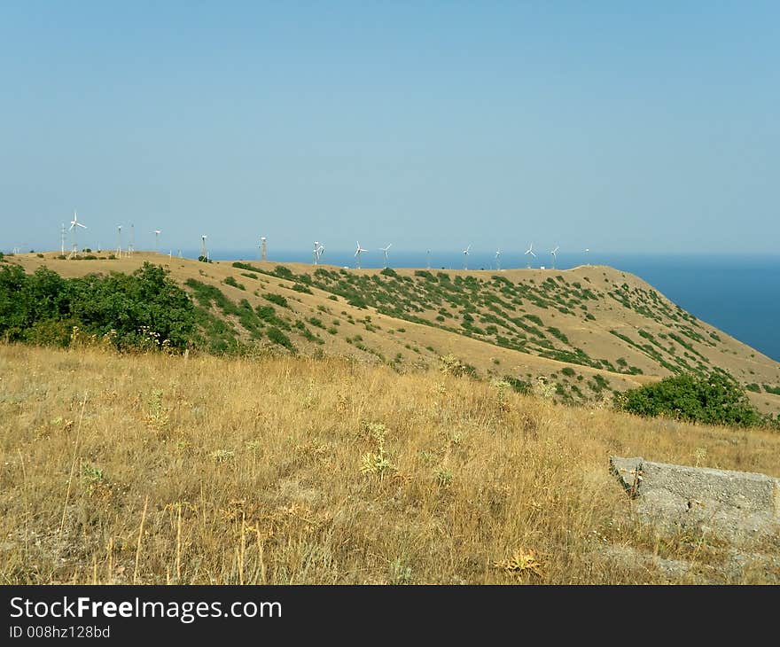 Windmachines on coast of sea