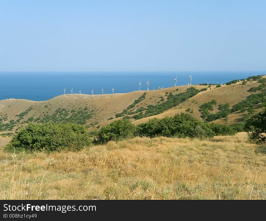 Windmachines on coast of sea