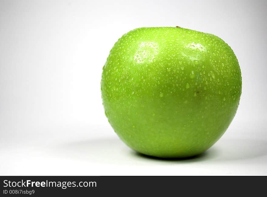 Green apple on white background