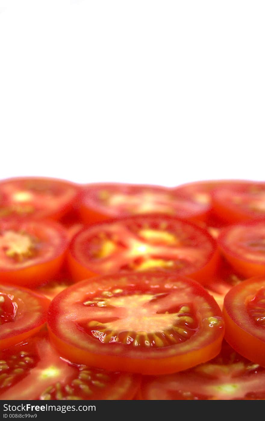 Red tomatoes on white background