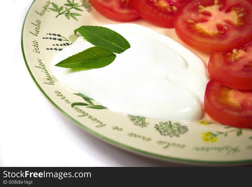 Red tomatoes on white background