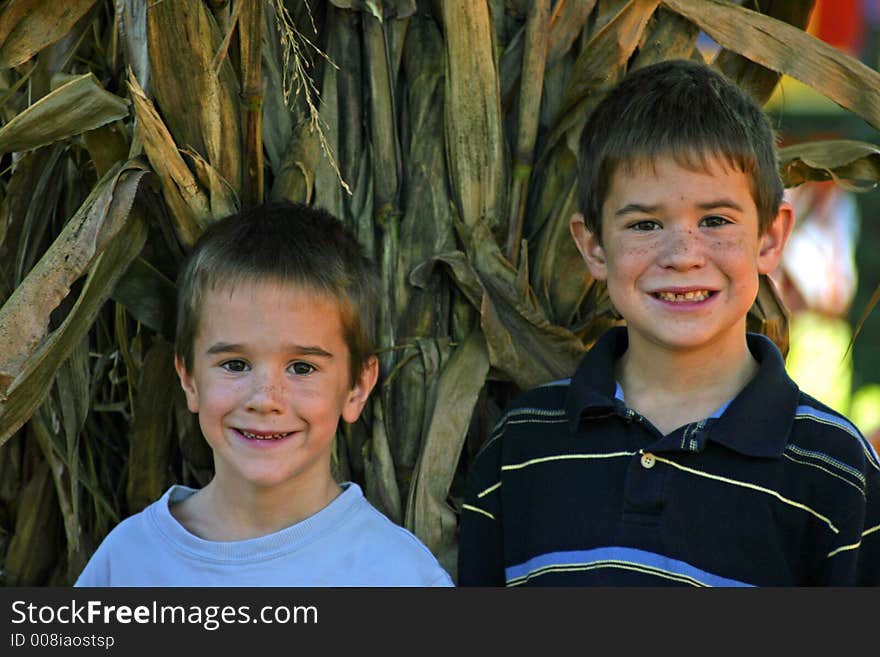 Boys In Pumpkin Patch