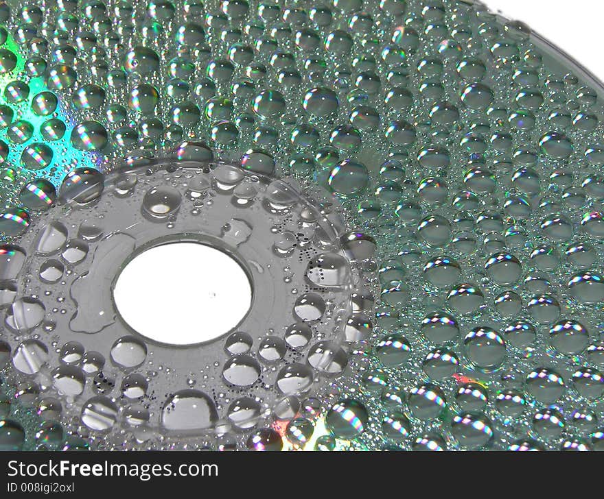 Water drops on a surface of compact disc. Water drops on a surface of compact disc