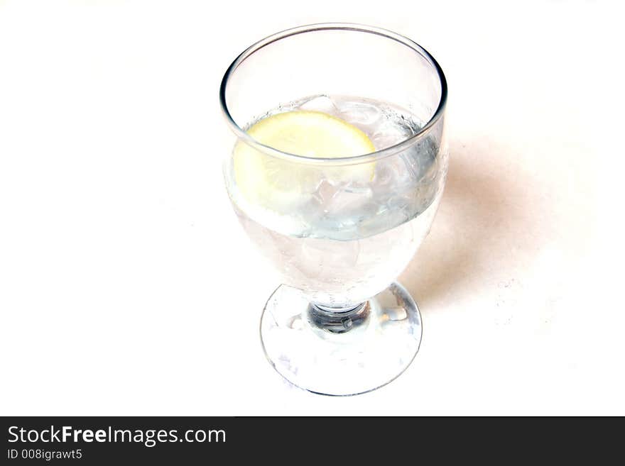 Glass of water with a slice of lemon