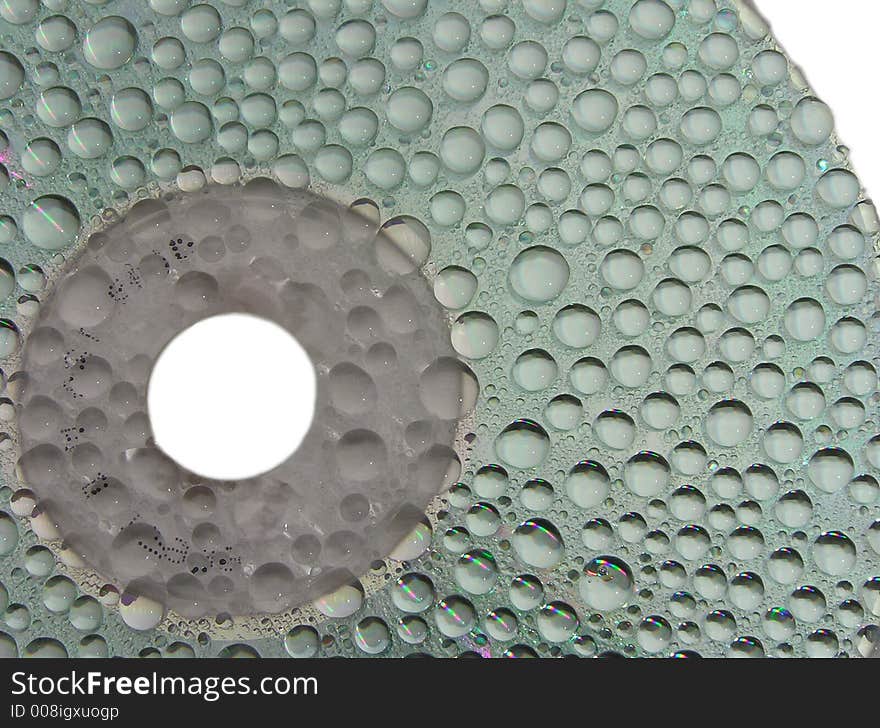 Water drops on a surface of compact disc. Water drops on a surface of compact disc