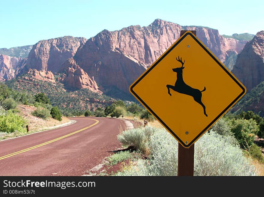 Deer road sign and breathtaking mountains. Deer road sign and breathtaking mountains