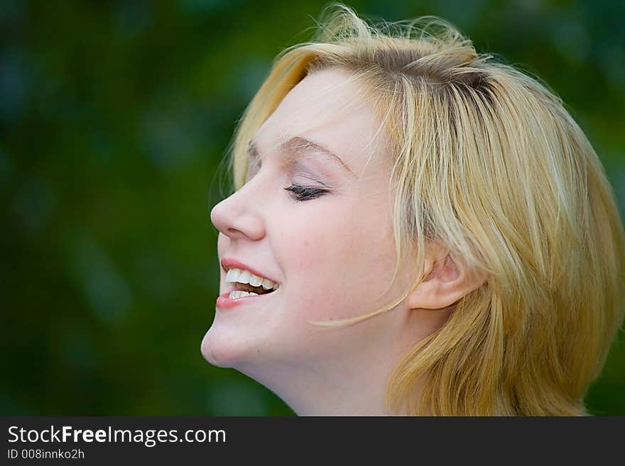 Beautiful Yong Blonde Girl with Blue Eyes