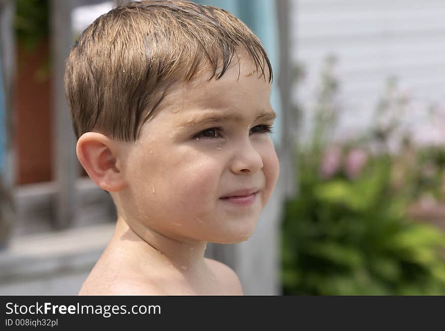 Profile of young boy smiling. Profile of young boy smiling