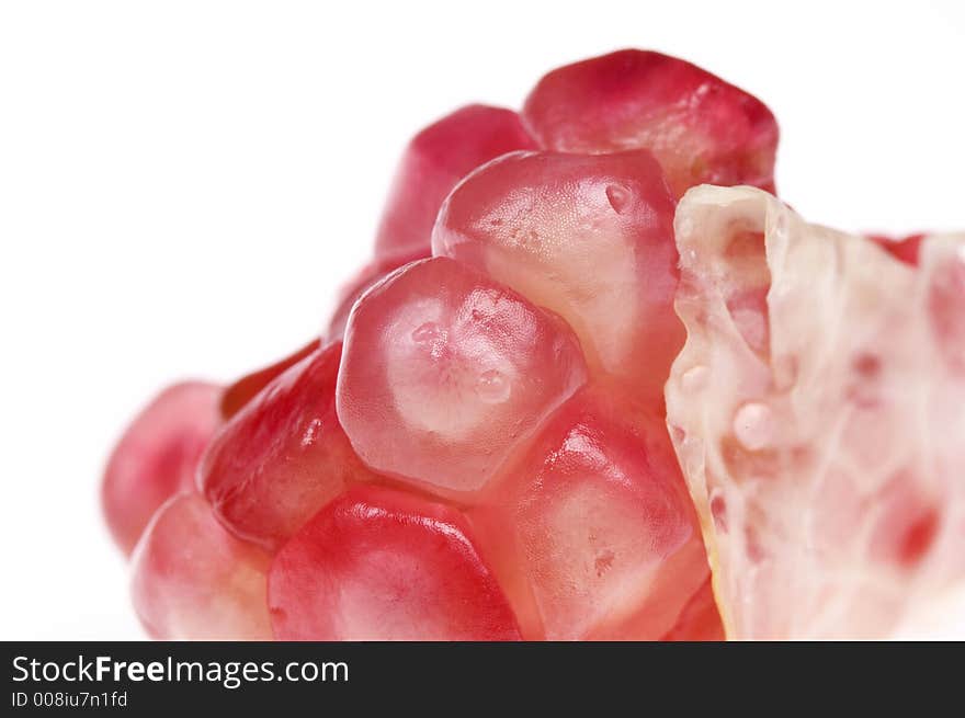 Close up macro shot of pomegranate seeds. One of the superfoods that can lower cholesterol. Close up macro shot of pomegranate seeds. One of the superfoods that can lower cholesterol