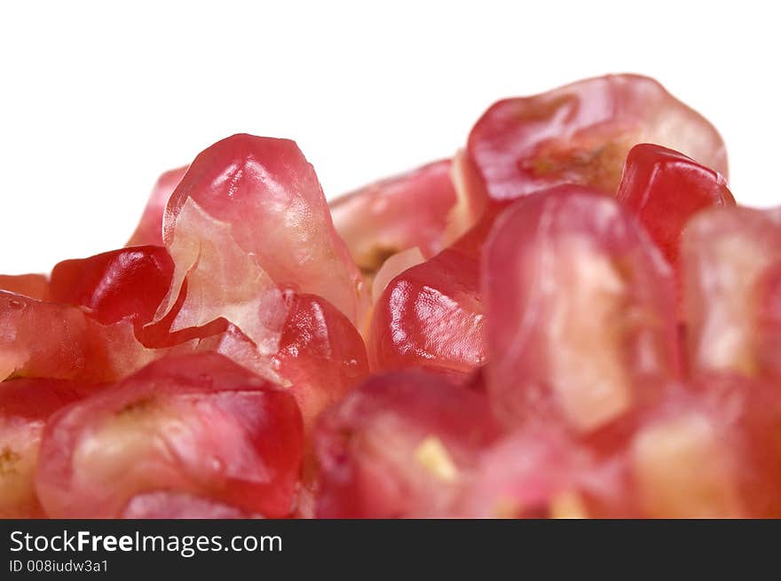 Close up macro shot of pomegranate seeds. One of the superfoods that can lower cholesterol. Close up macro shot of pomegranate seeds. One of the superfoods that can lower cholesterol