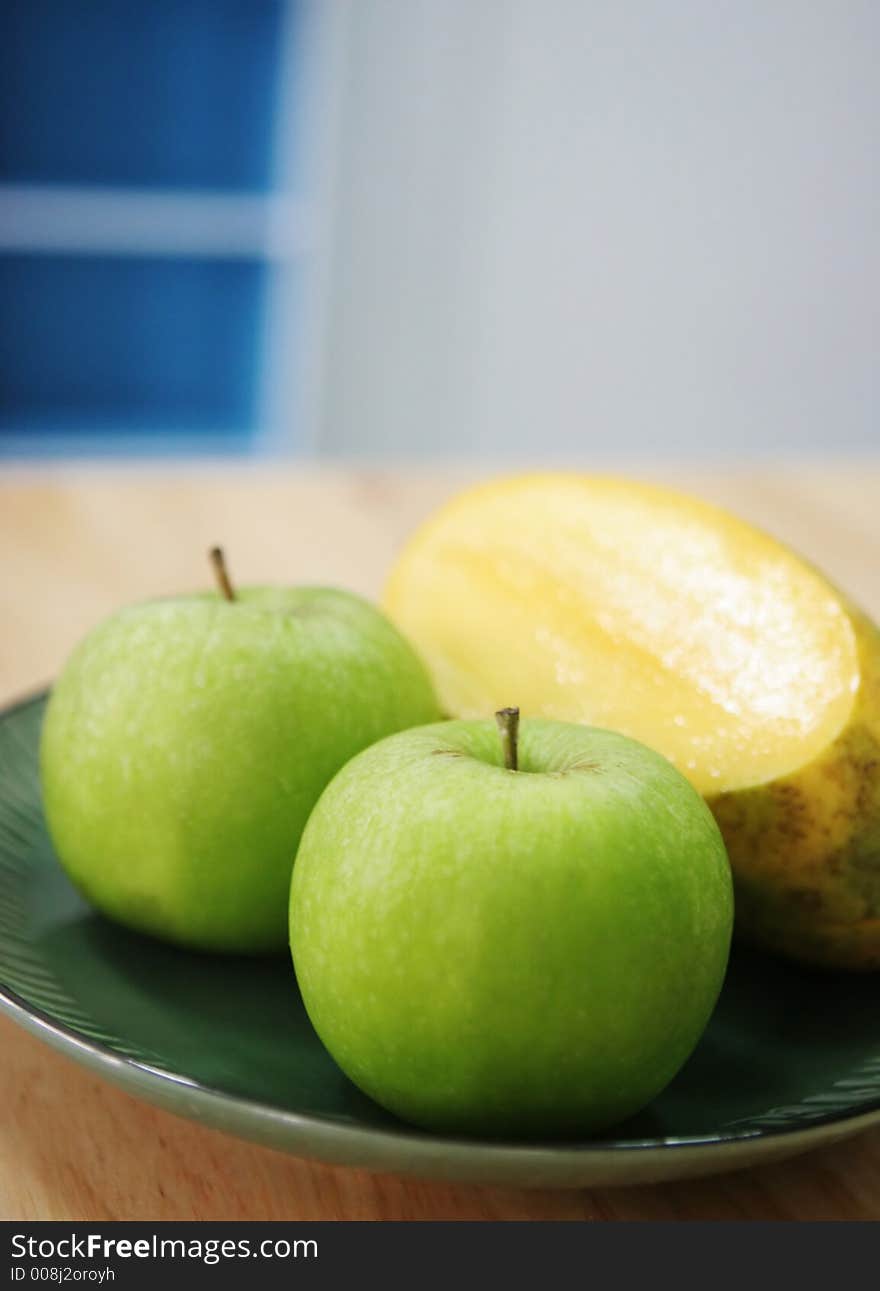 Luscious fresh fruit - green apples and mango