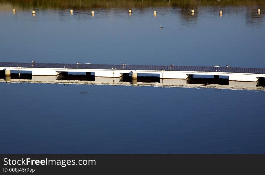 Lake mole with clear blue ad peacefully water. Lake mole with clear blue ad peacefully water