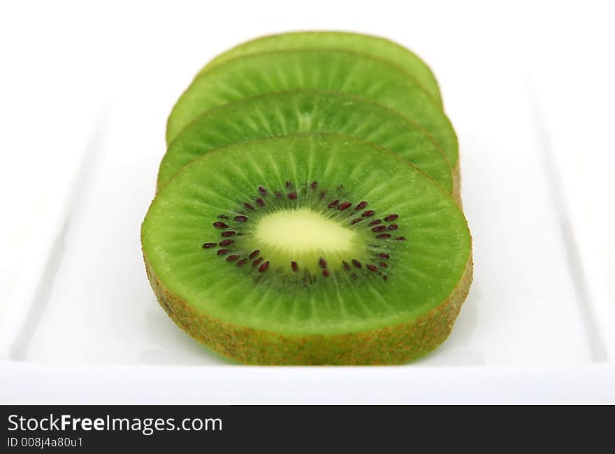 Tropical green kiwi fruit, isolated, closeup