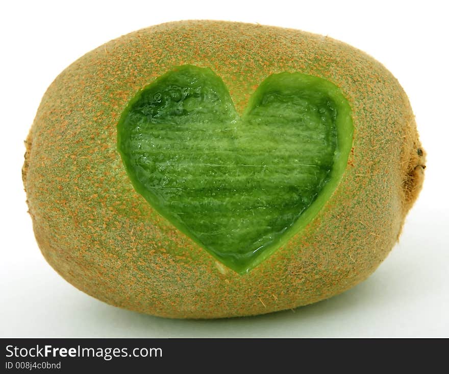 Tropical romantic love heart kiwi fruit, isolated, closeup. Tropical romantic love heart kiwi fruit, isolated, closeup