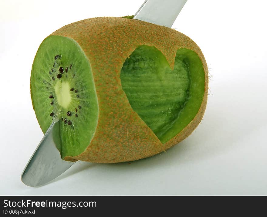 Tropical romantic love heart kiwi fruit, isolated, closeup. Tropical romantic love heart kiwi fruit, isolated, closeup