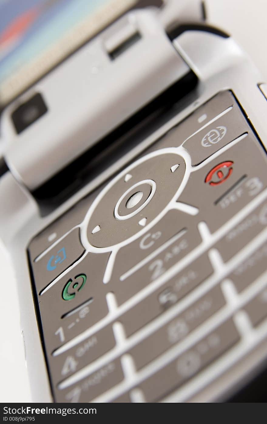 A close-up shot of a mobile phone's keypad. A close-up shot of a mobile phone's keypad