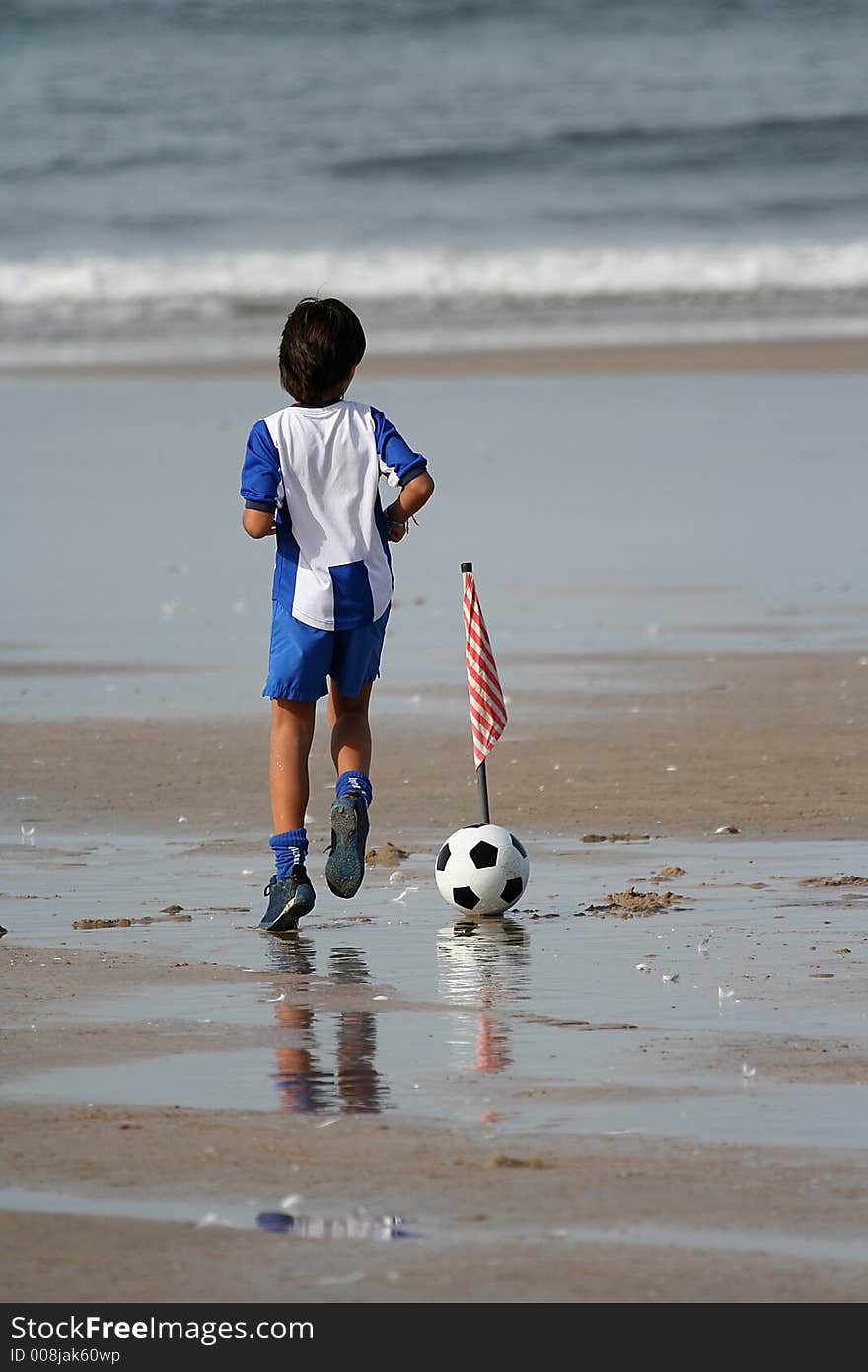 Boy Playing Soccer