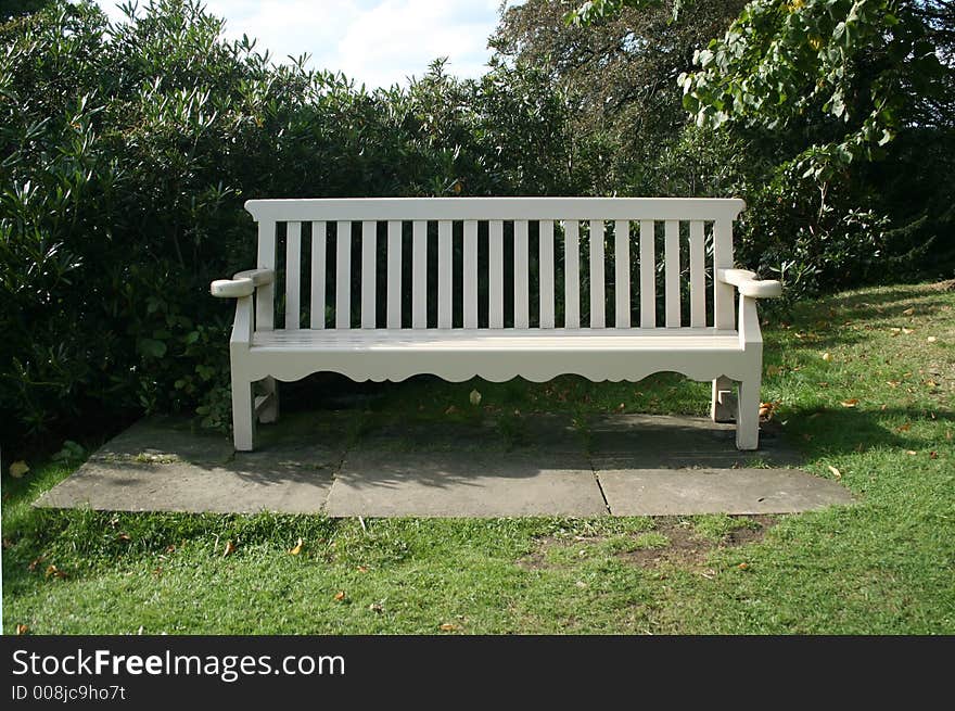 Park bench in a park on a summers day