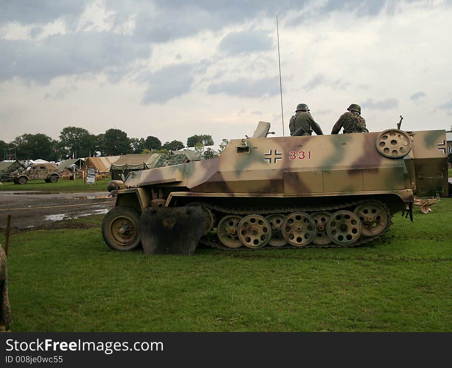 German soldiers at a military re-enactment in a half track. German soldiers at a military re-enactment in a half track