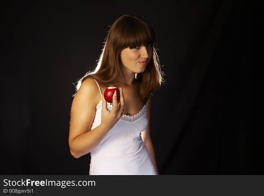 Healthy woman posing with apple. Healthy woman posing with apple